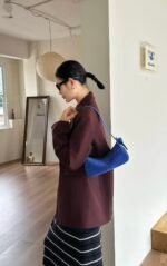 Nodo underarm bag model carrying royal blue