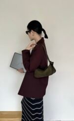 Nodo underarm bag model with cypress green color