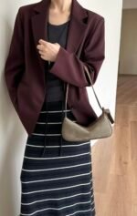 Nodo underarm bag model carrying caramel color